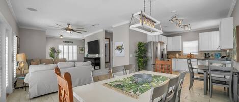 Fantastic open concept on the second floor with a 75" TV and plenty of seating for the whole group!