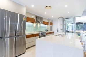 Huge luxurious kitchen with quality appliances. 