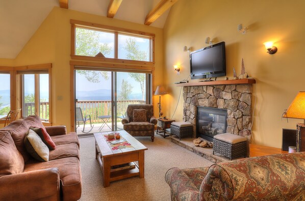 Warm and cozy living area with gorgeous mountain and lake views