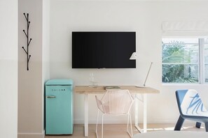 Unit with mini-fridge and flat-screen TV