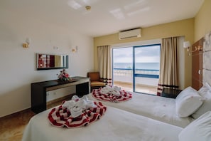 Bedroom. Exact unit will be assigned upon arrival. Views, colors and decor may vary.