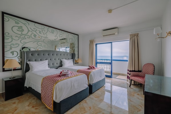 Bedroom. Exact unit will be assigned upon arrival. Views, colors and decor may vary.