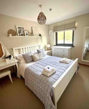 Luxury bedroom with double bed.