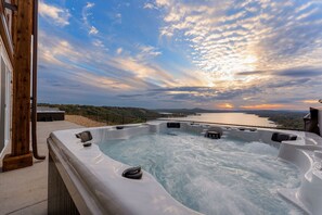 Two hot tubs overlooking the lake