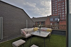 The roof terrace provides an excellent opportunity to wind down and enjoy a late-afternoon drink