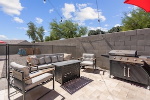 Additional outdoor seating with firepit and gas bbq grill