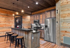 Whip up your favorite recipes in our kitchen that blends rustic vibes with all the modern amenities you need.