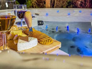 Hot Tub Oasis: Indulge in evenings with gourmet snacks and bubbling relaxation under starry skies!