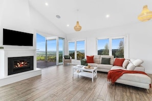 Main living room with fireplace.