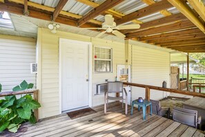 covered back deck with ramp access from carport