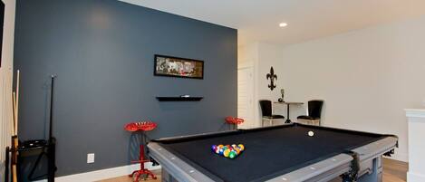 Billiards room with TV