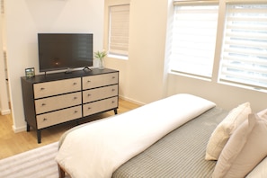 Master bedroom with smart roku TV