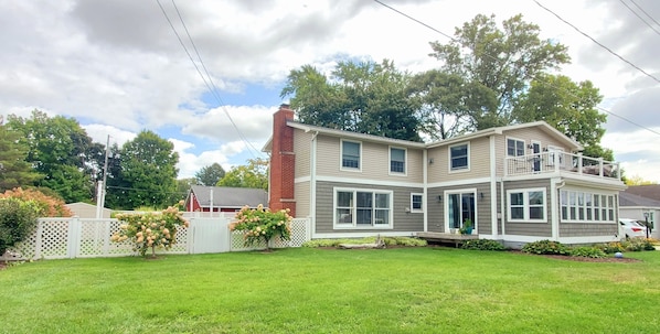 Spacious side lot and enclosed back yard