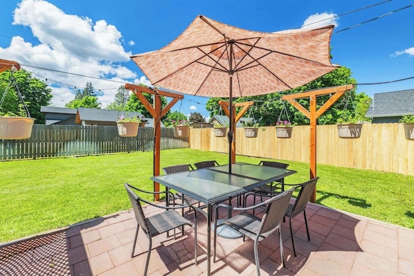 Fully fenced backyard and patio.