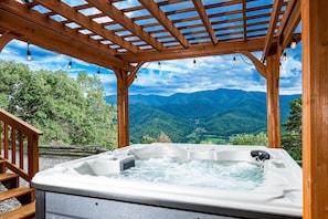Luxuriate in the new 7 seater hot tub with incredible views