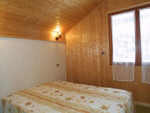 Forge-D-chambre-lit-double-location-appartement-chalet-Les-Gets