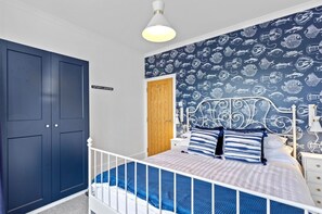 Nautical master bedroom with king size bed