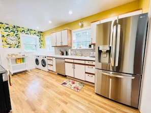 Spacious Kitchen with stainless steal appliances and washer and dryer