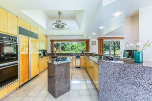 Indulge in a chefs dream kitchen with thermador stove /oven , and subzero fridge.