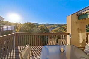 Escape to nature and soak in the peaceful views from your large private deck - the perfect spot to unwind, connect with your surroundings, and rejuvenate