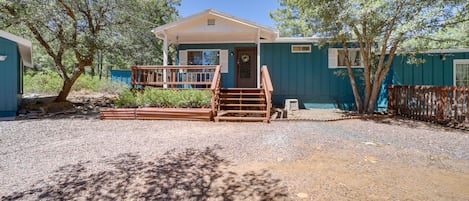 Pine Vacation Rental | 3BR | 2BA | Stairs to Access | 1,500 Sq Ft
