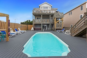 Back exterior with private pool