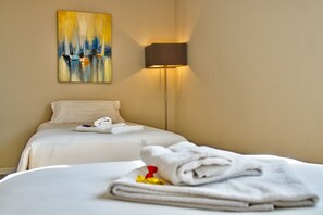 Unit with 1 Double bed and a seating area equipped with a sofa bed or 2 separate single beds. Exact unit will be assigned upon arrival. Views, colors and decor may vary.