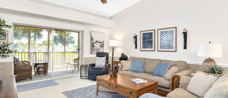 Gorgeous golf-course view over the lake and 16th fairway from the living room.