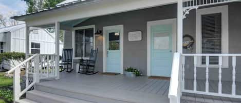 The front porch with rocking chairs to enjoy your morning coffee or tea.