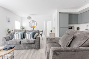 The apartment benefits from an open planned living space