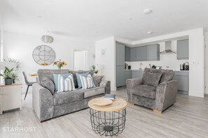 The layout for this two-bedroom apartment is cohesive & welcoming