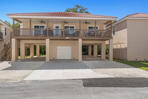 The front side of the beautiful 3 BR, 2 BA Tarpon on stilts.