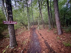 There are multiple named and mapped trails that meander through the property.