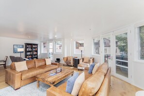 Open living/dining area with plenty of space for entertaining, relaxing. This Unit offers amazing private decks overlooking the Telluride Valley with natural light.