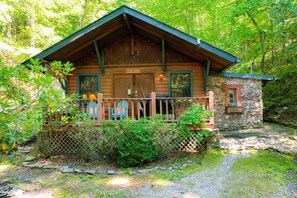 front of the cabin. The covered deck is great for morning coffee