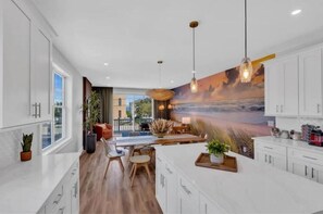 Open concept kitchen/living/dining area