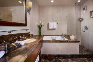 Get ready for the day ahead in the large and bright bathroom.