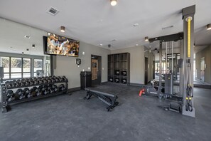 Communal Area: Gym offering a wide range of workout equipment, and a Smart TV.