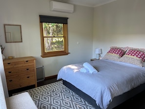 Main bedroom with comfortable queen bed