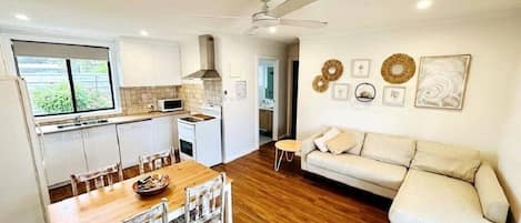 Unit 3 - Open living area with fully equipped kitchen, dining and lounge.