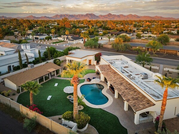 Newly remodeled Tee Time with putting green, private pool, hot tub, guest house and more