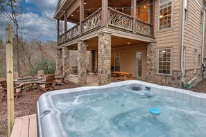 Relax in the hot tub under the stars.