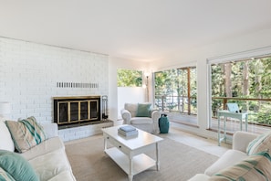 An abundance of natural light fills the living room