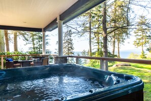 Unwind in the jetted hot tub on your private porch.