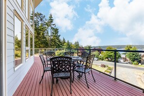 Expansive deck for dining and sun-drenched relaxation