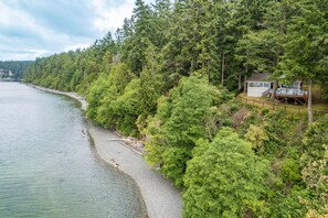 Where the shoreline gracefully embraces the beauty of nature.