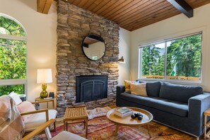 Spacious living room with a gas fireplace.