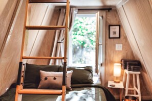 Your cozy living space of this tiny A-Frame secluded in nature