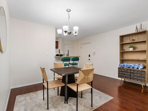 With ample seating and a stylish ambiance, this space is perfect for enjoying home-cooked meals or takeout from local eateries. 
