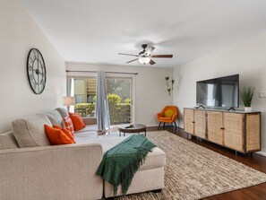 Welcome to the heart of our stylish retreat! Our living room exudes comfort and modern charm, featuring plush furnishings and contemporary decor. 
